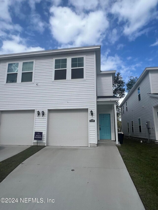 front facade with a garage