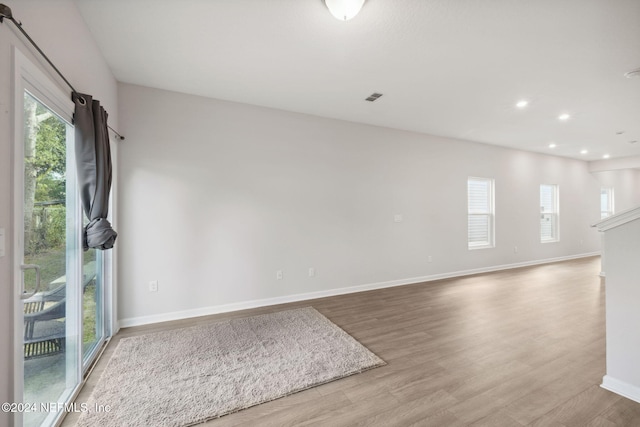 unfurnished room featuring light hardwood / wood-style flooring