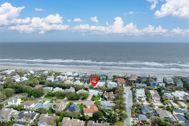 birds eye view of property with a residential view and a water view