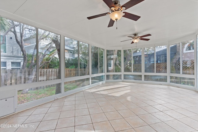 unfurnished sunroom featuring a wealth of natural light