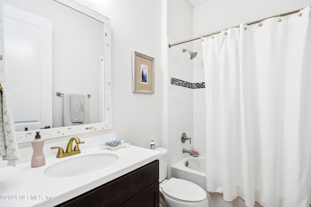 full bathroom with vanity, toilet, and shower / tub combo with curtain