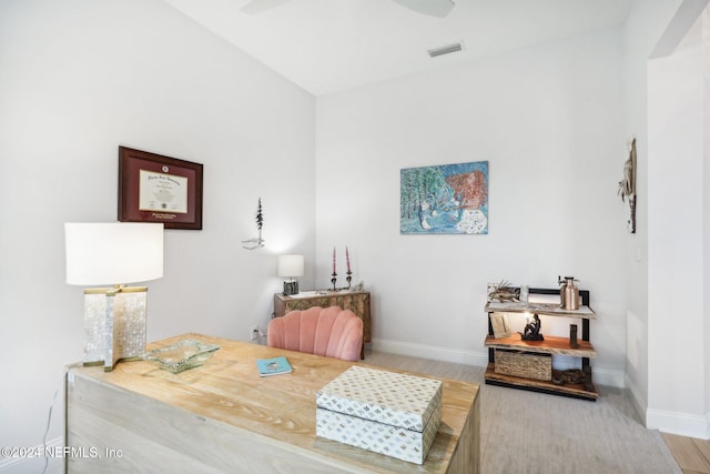 bedroom with ceiling fan and hardwood / wood-style floors