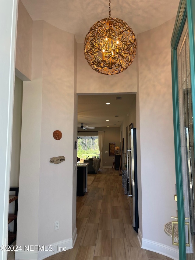 corridor featuring hardwood / wood-style floors