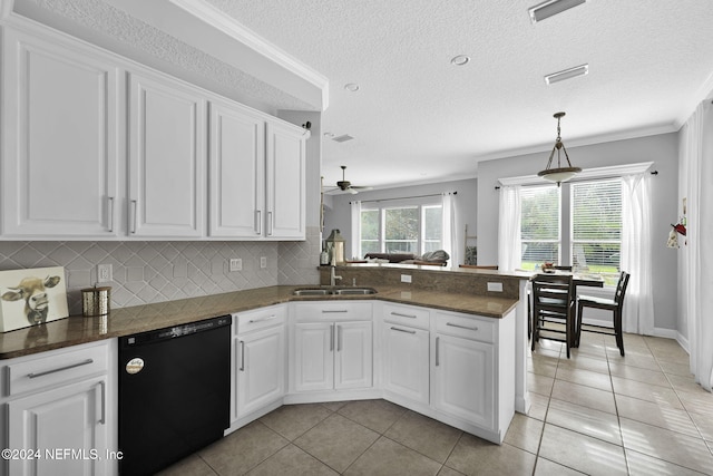 kitchen with dishwasher, white cabinetry, kitchen peninsula, and light tile patterned floors