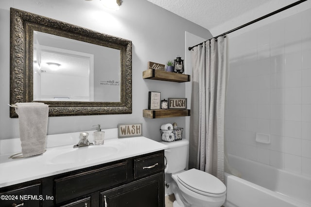 full bathroom with shower / bath combination with curtain, toilet, a textured ceiling, and vanity