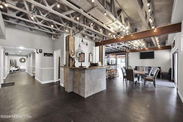 kitchen with a towering ceiling