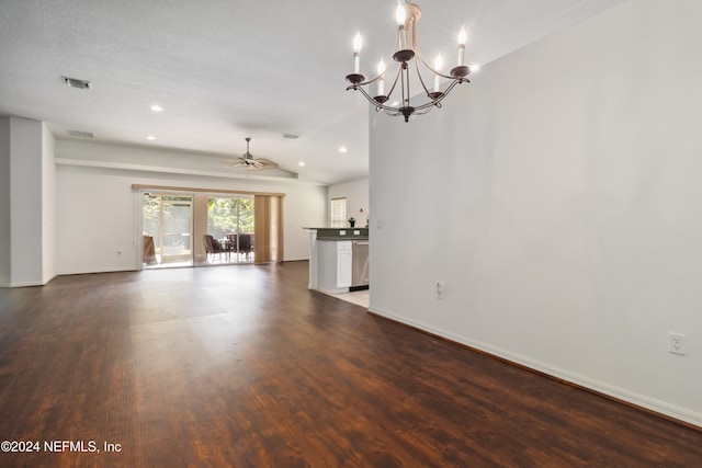 unfurnished living room featuring a textured ceiling, ceiling fan with notable chandelier, dark wood-type flooring, and vaulted ceiling