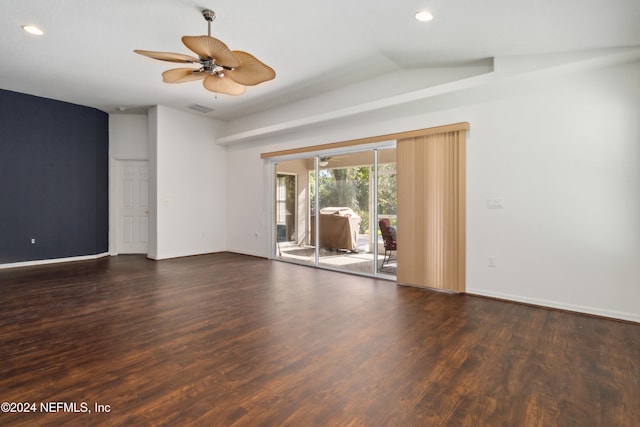 unfurnished room featuring dark hardwood / wood-style floors, ceiling fan, and lofted ceiling