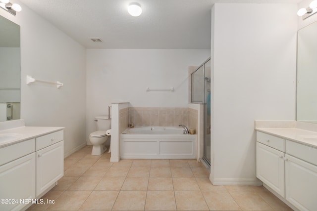 full bathroom with tile patterned flooring, toilet, and independent shower and bath