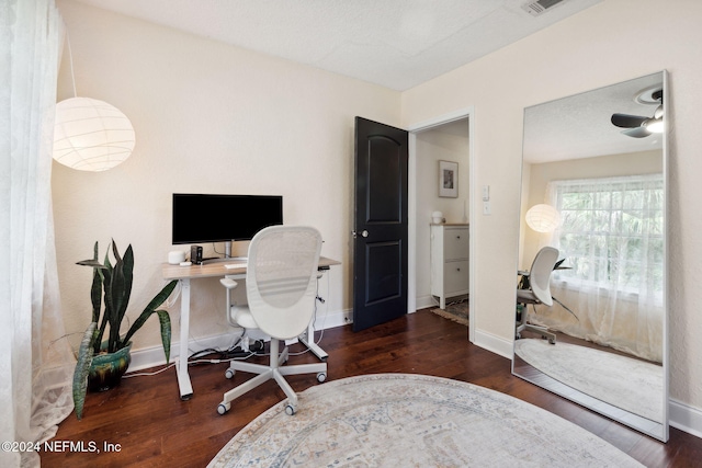 home office featuring dark hardwood / wood-style floors