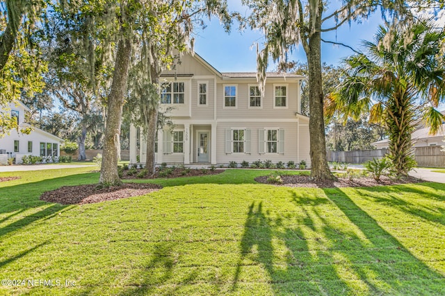 view of front facade with a front lawn