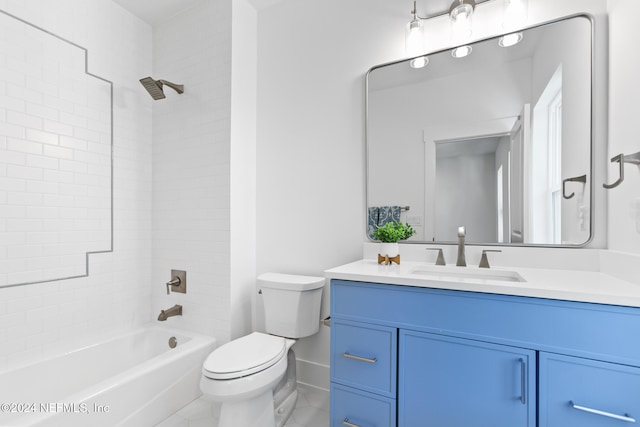 full bathroom featuring vanity, tiled shower / bath combo, and toilet