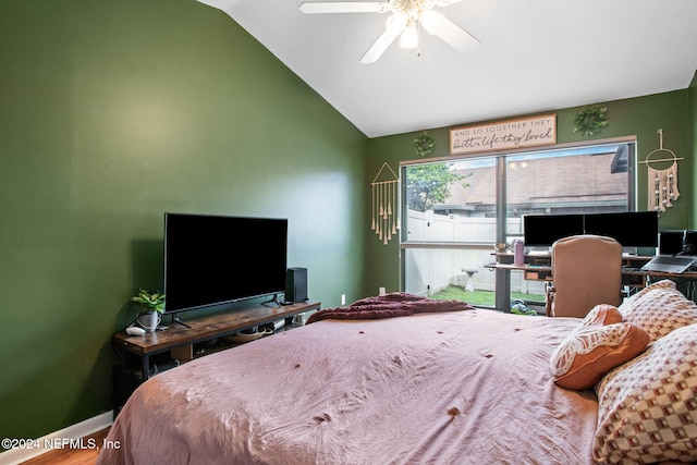 bedroom featuring ceiling fan and vaulted ceiling