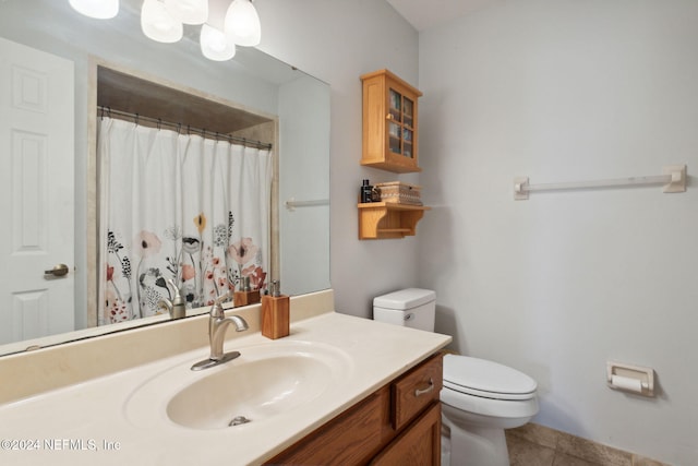 bathroom featuring tile patterned floors, vanity, toilet, and a shower with curtain