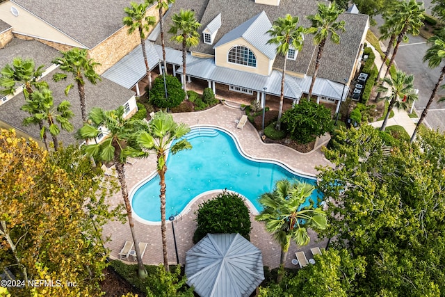 view of swimming pool featuring a patio