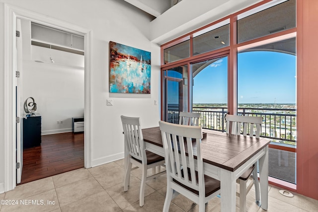 dining area with hardwood / wood-style floors