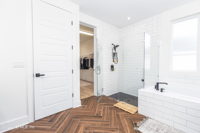 bathroom with plus walk in shower and parquet flooring