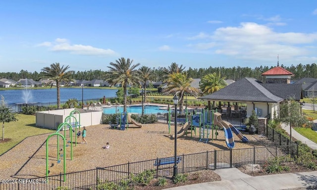 view of jungle gym featuring a water view