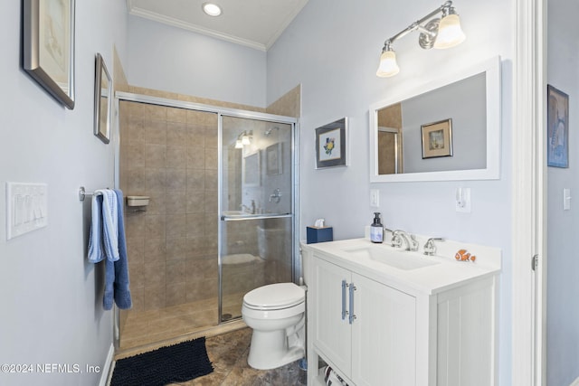 bathroom featuring vanity, toilet, walk in shower, and crown molding