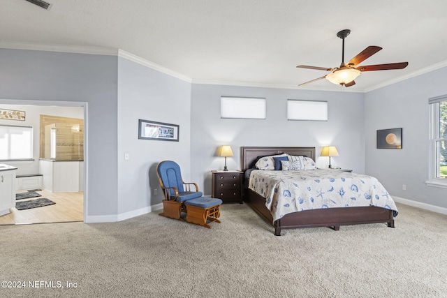 bedroom with light carpet, ceiling fan, and crown molding