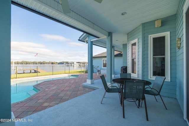 view of patio with a fenced in pool