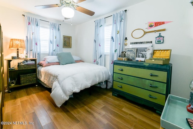 bedroom featuring ceiling fan and hardwood / wood-style floors