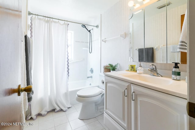 full bathroom featuring tile patterned floors, vanity, shower / bath combination with curtain, and toilet