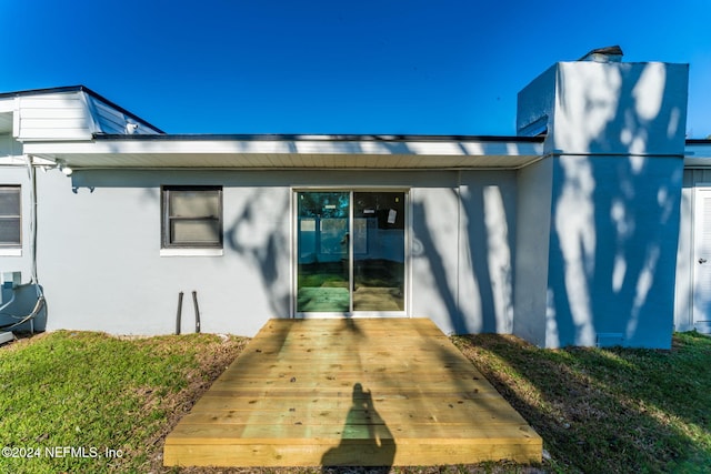 rear view of house with a deck