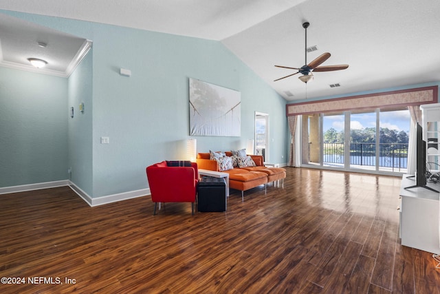 living room featuring ceiling fan, crown molding, dark wood-type flooring, and lofted ceiling