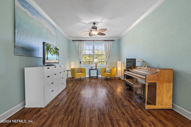 miscellaneous room with crown molding, ceiling fan, and dark hardwood / wood-style floors