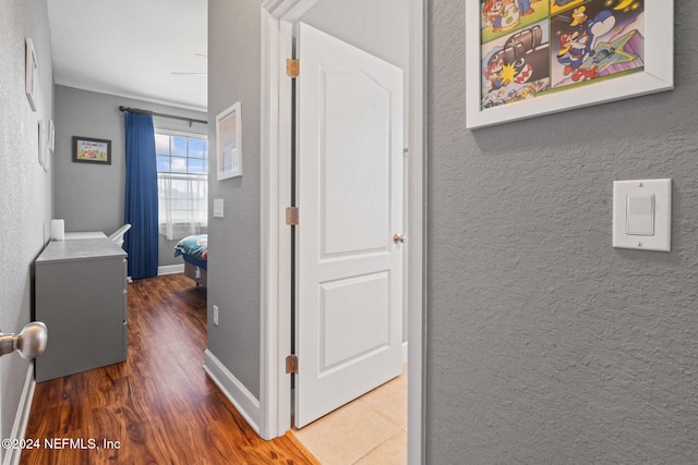 hallway featuring dark hardwood / wood-style flooring