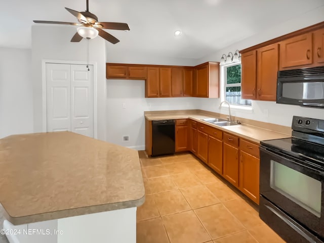 kitchen with ceiling fan, a center island, sink, light tile patterned floors, and black appliances