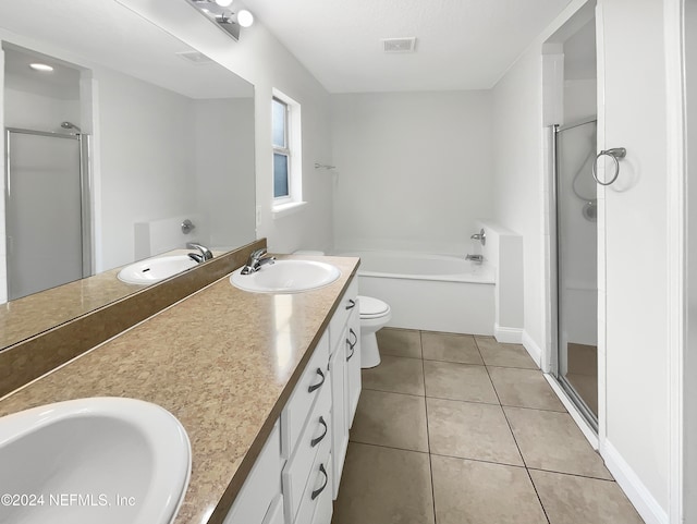 full bathroom featuring tile patterned floors, vanity, toilet, and plus walk in shower