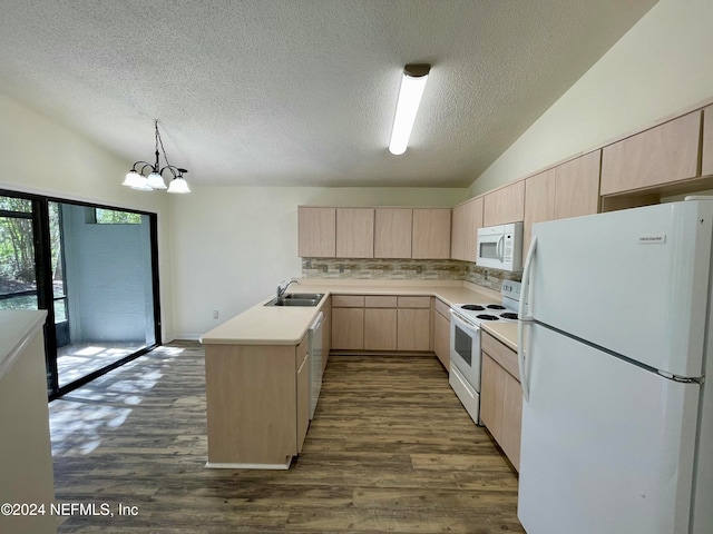 kitchen with light brown cabinetry, white appliances, vaulted ceiling, dark wood-type flooring, and sink