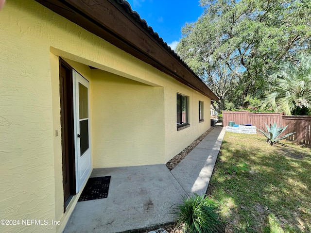 view of home's exterior featuring a yard