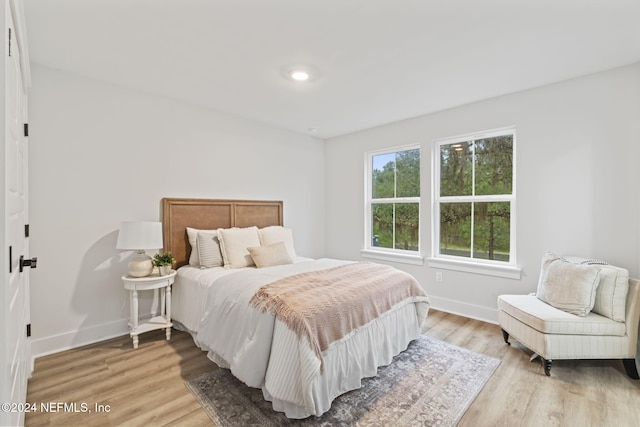 bedroom featuring hardwood / wood-style floors