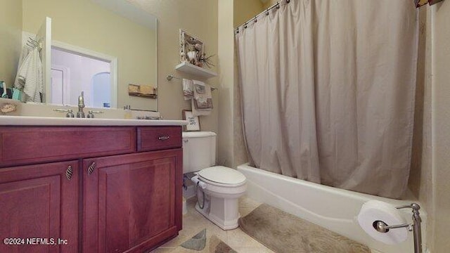 full bathroom with shower / bath combination with curtain, vanity, toilet, and tile patterned flooring