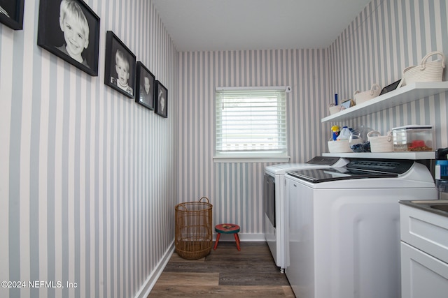 washroom with dark hardwood / wood-style flooring and separate washer and dryer