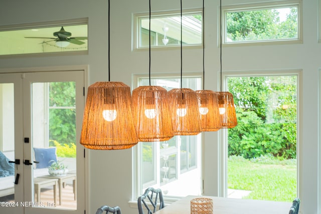 doorway to outside with ceiling fan, plenty of natural light, and french doors