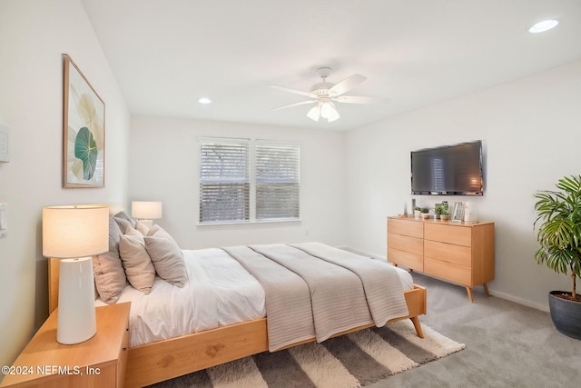 carpeted bedroom featuring ceiling fan