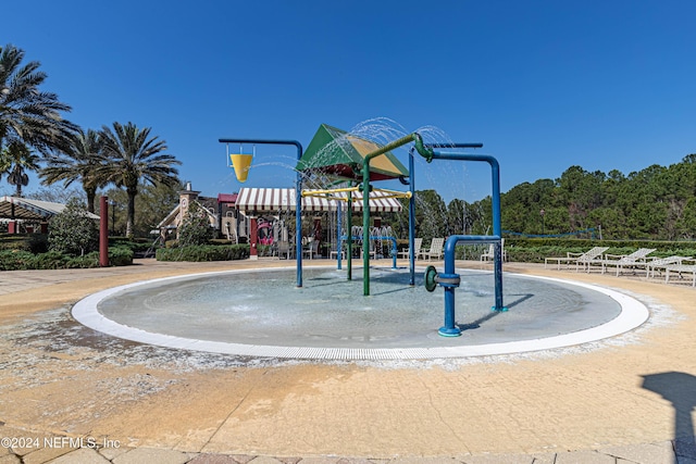 view of property's community featuring playground community