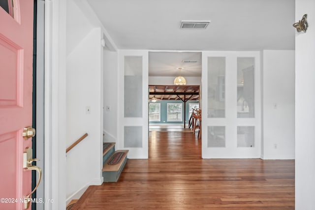 entryway featuring ceiling fan and dark hardwood / wood-style flooring