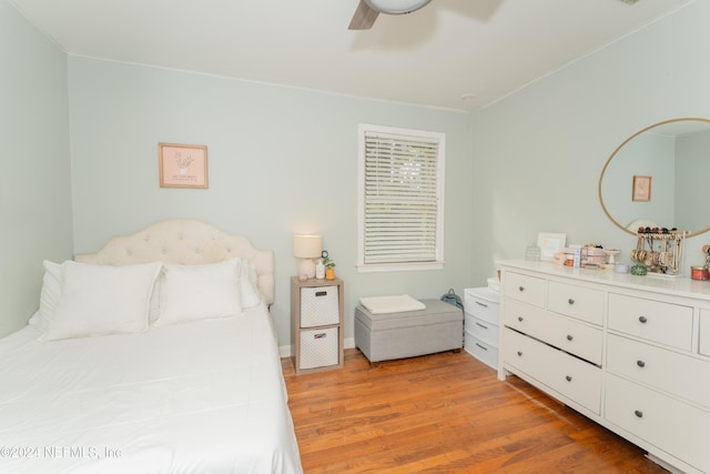 bedroom featuring ceiling fan and light wood-type flooring