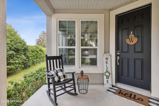 property entrance with a porch