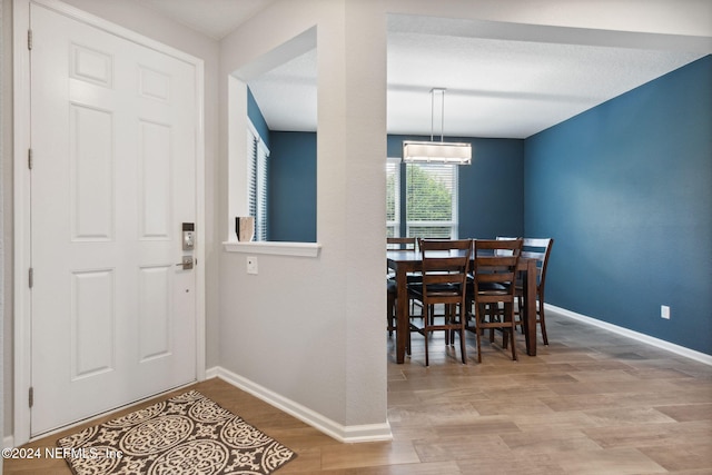 dining area with light wood-type flooring