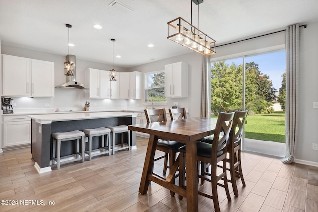 dining space featuring light hardwood / wood-style flooring