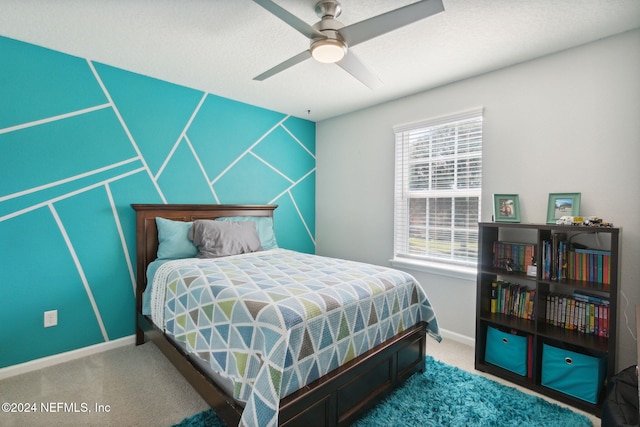 bedroom featuring carpet and ceiling fan