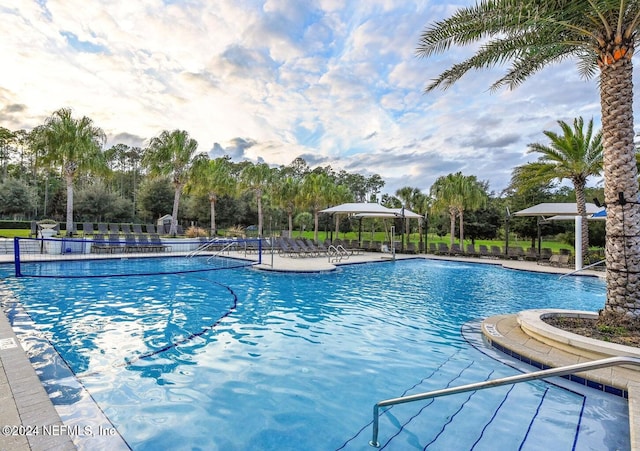 view of swimming pool with a patio