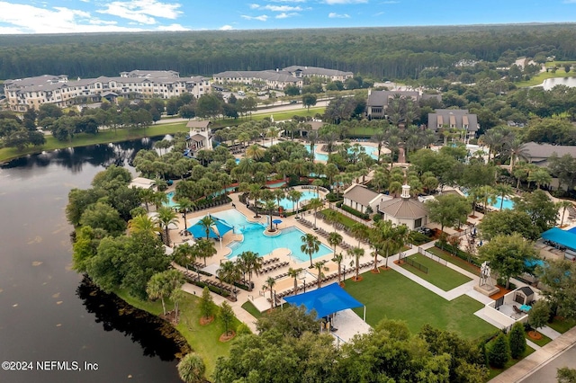 drone / aerial view with a water view