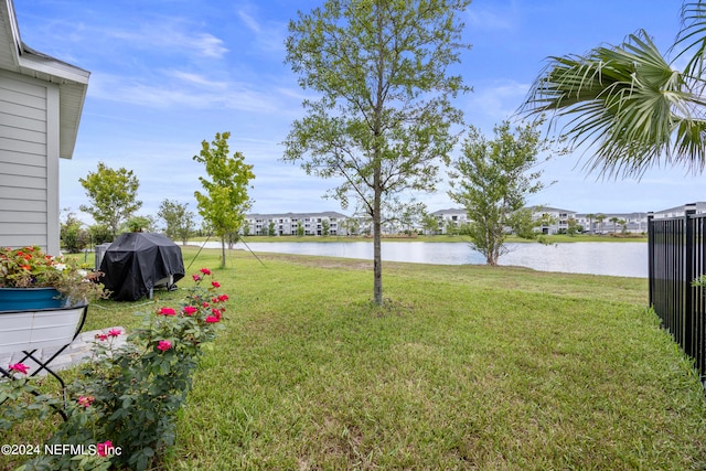 view of yard with a water view